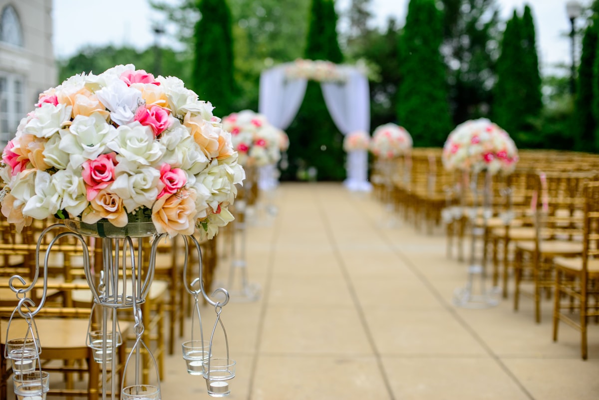Wedding DJ booth setup with mixing console and warm reception lighting at a Montana venue