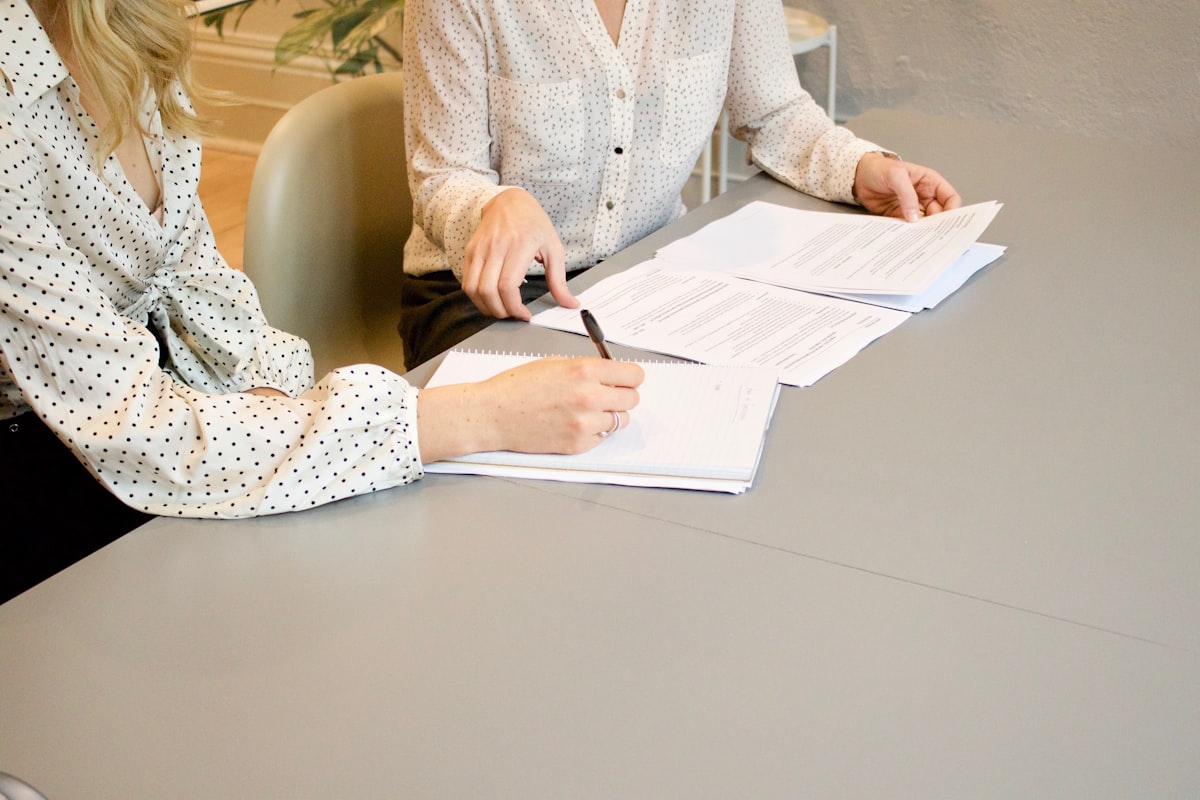 Couple meeting with wedding DJ to discuss questions and planning details