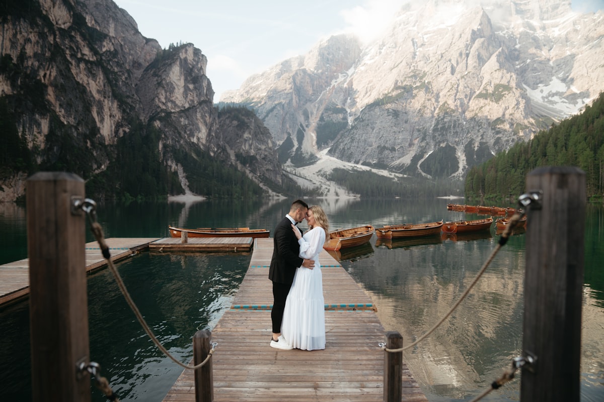 Golden-hour September wedding ceremony beside Flathead Lake with calm water