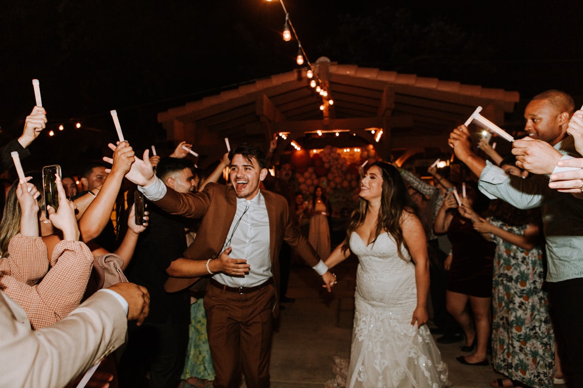 Wedding DJ coordinating reception timeline and making announcements