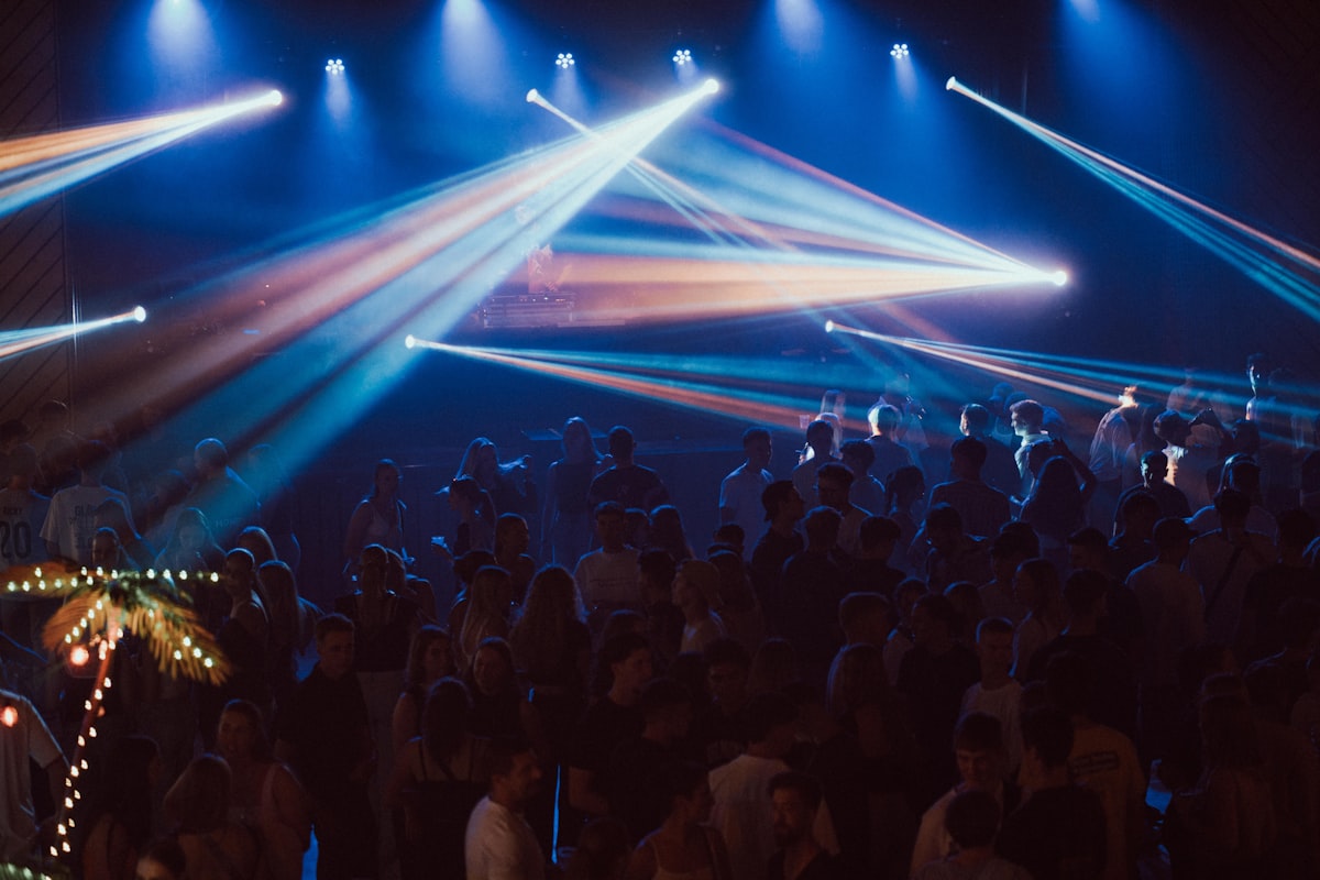 Wedding reception dance floor with DJ booth and professional lighting