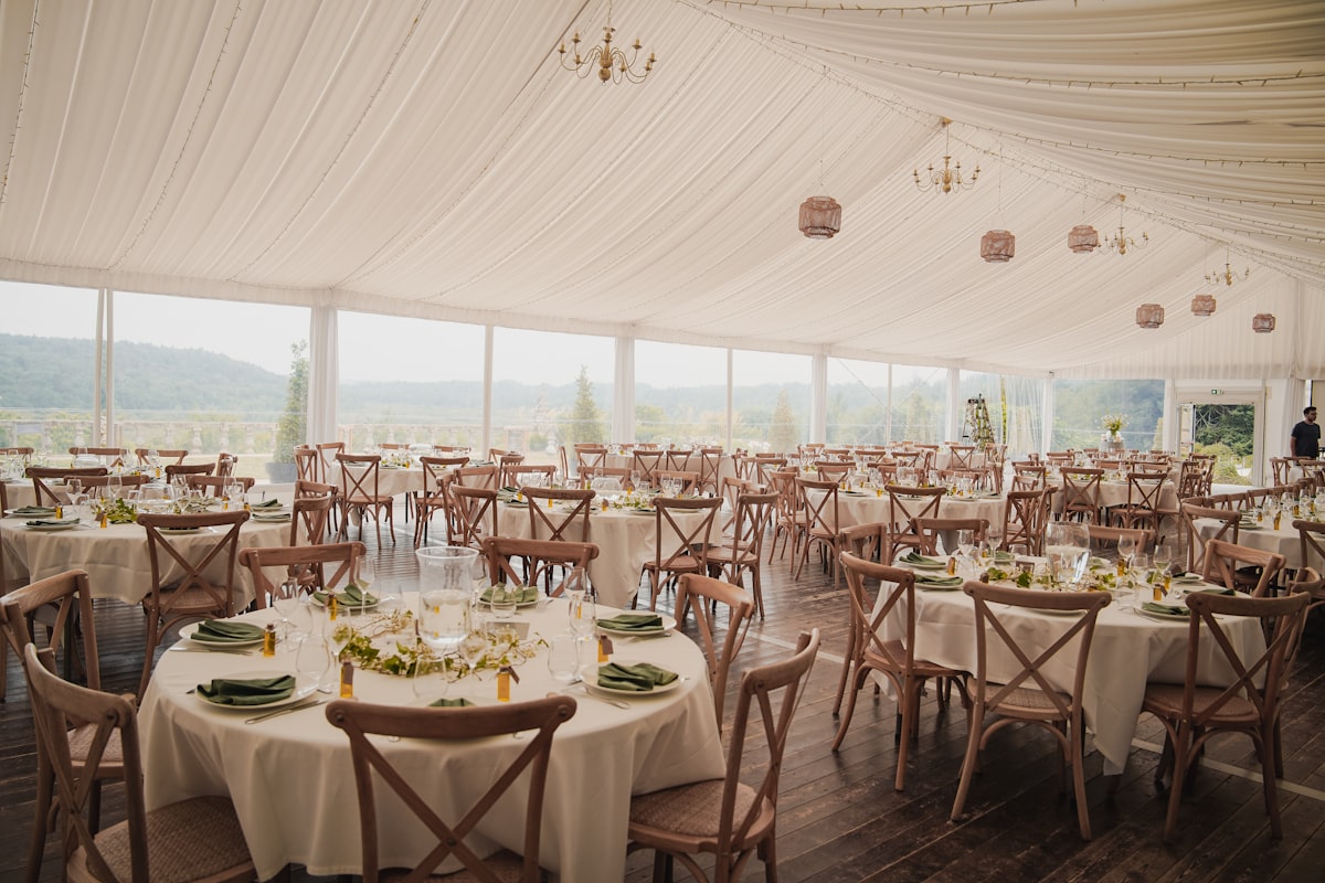 Wedding vendors coordinating setup at Montana reception venue