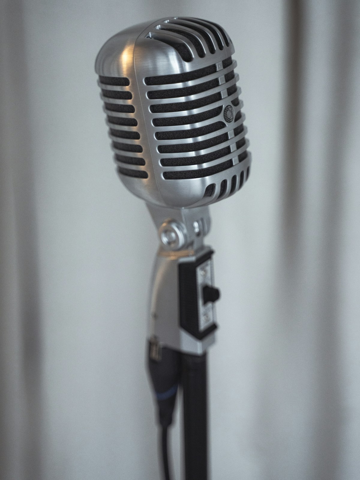 Wireless microphone on a stand ready for an officiant at an outdoor Montana vow exchange